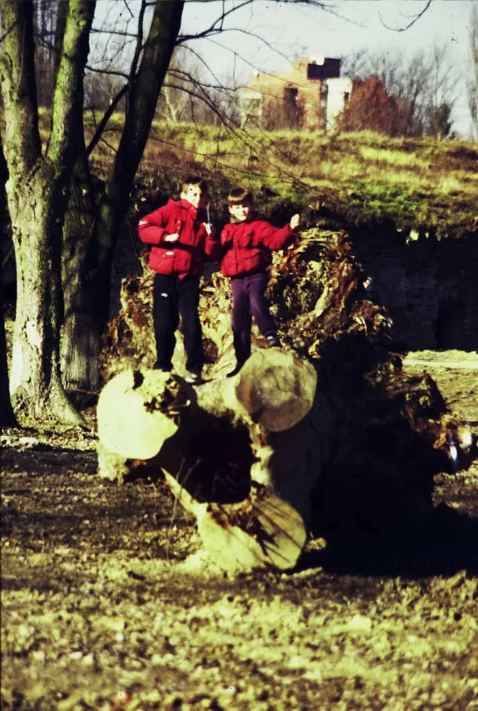 Filip Dorić and his brother as kids, exploring sounds on a piano and synthesizer — early roots of music for your digital journey.