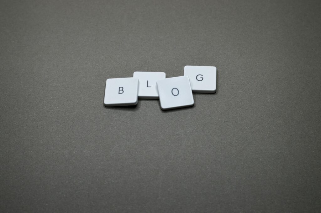 The word “Blog” displayed on a screen, representing a powerful tool for consistent growth without being tired of chasing algorithms. Filip Doric can help you start.