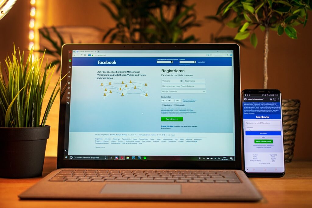 laptop, mobile, facebook, social media, smartphone, computer, notebook, office, internet, technology, desk, macbook, monitor, influencer, facebook icon, pc, facebook, facebook, facebook, facebook, facebook, social media, influencer.Facebook interface displayed on a laptop and mobile screen, showing how Meta Business Suite connects across devices.