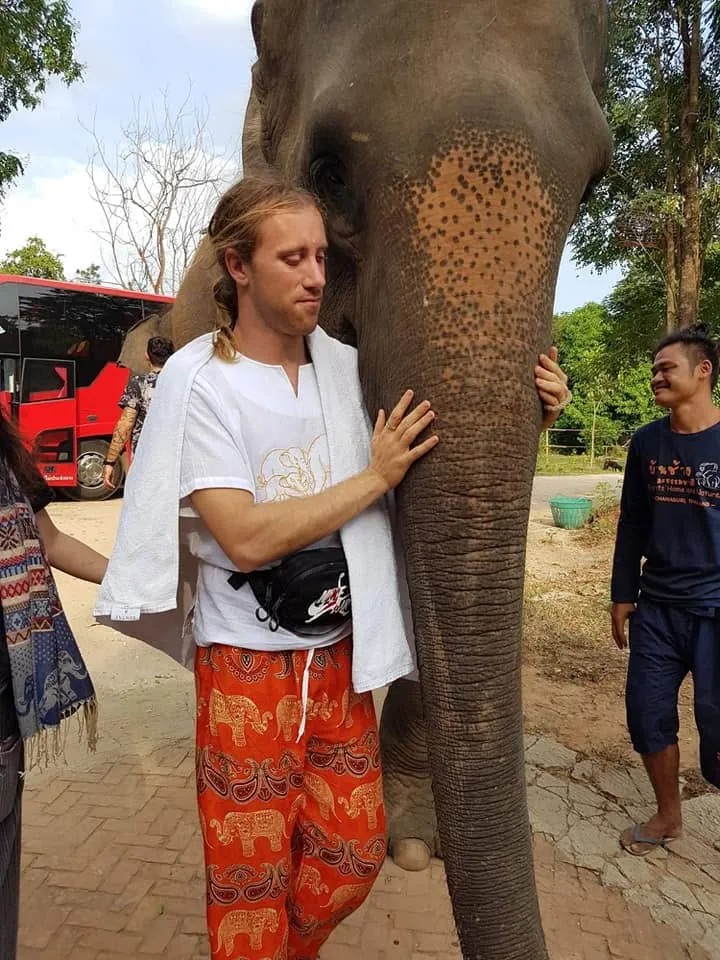 Antun Vlašić with an elephant during his travels, featured in “How I Helped Antun Launch His Author Website”